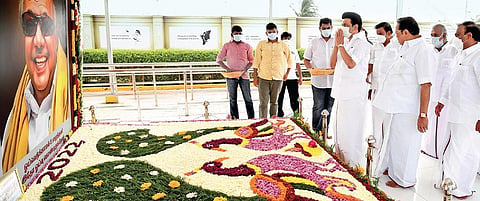 Chief Minister MK Stalin paying floral tributes at the memorial of DMK patriarch M Karunanidhi, on the occasion of New Year, in Chennai on Saturday | Express