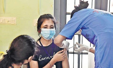 A student receiving Covid vaccine at Ernakulam Government Girls Higher Secondary School on Wednesday | Albin Mathew