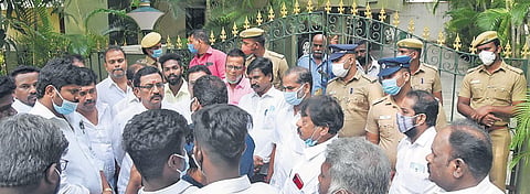 Cadre outside KP Anbalagan's Cathedral Garden Road house in Chennai. (Photo| R Satish Babu, EPS)