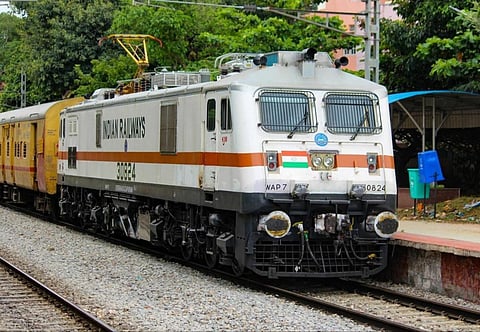 Shot of a train running with electric engine.