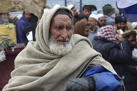 People of Afghanistan waiting to receive provisions from international aids (File photo | AP)