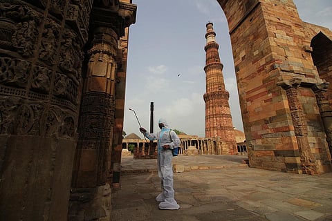 Sanitisation works at Qutub Minar and Humayun’s Tomb (File Photo | EPS/Shekhar Yadav)