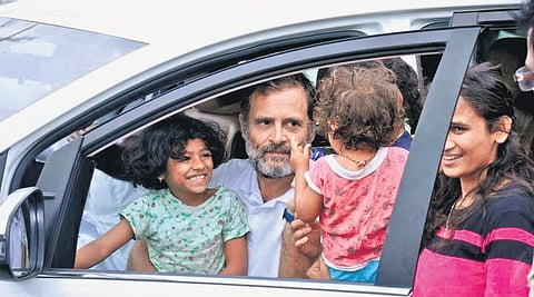 Congress MP Rahul Gandhi interacts with children, during the Bharat Jodo Yatra, at Chikka-nayakanahalli in Tumakuru district on Sunday | EXPress