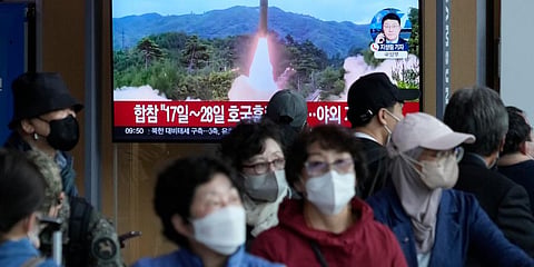 A TV screen shows a file image of North Korea's missile launch during a news program at the Seoul Railway Station in Seoul, South Korea. (File photo | AP)