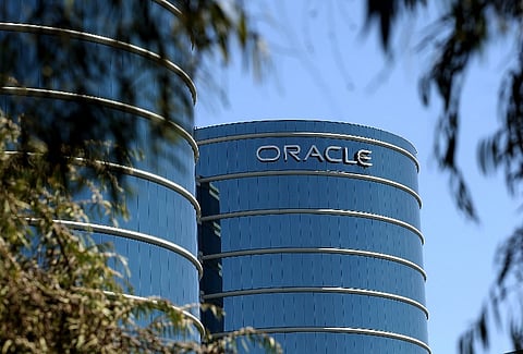 The Oracle logo is displayed on the exterior of the Oracle headquarters in Redwood Shores, California.(File |AFP)
