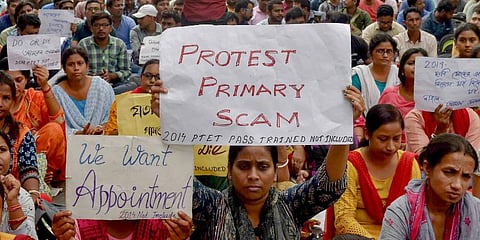 Pre-Teacher Education Test (PTET) qualified candidates of 2014 batch stage a protest against the alleged SSC scam seeking immediate appointment, in Kolkata, Wednesday, Oct. 19, 2022. (Photo |PTI)