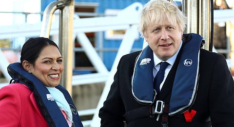 Boris Johnson and Ex-Home Secretary Priti Patel, (L). (Photo | AP)