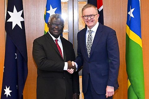 Australian Prime Minister Anthony Albanese, right, and Solomon Islands Prime Minister Manasseh Sogavare shake hands ahead of a bilateral meeting at Parliament House in Canberra. (Photo | AP)