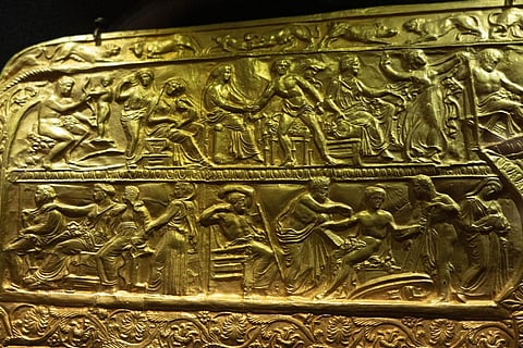 A copy of the fourth century B.C. golden ritual quiver, an ancient treasure from a Scythian king's burial mound, is exhibited in the Museum of Historical Treasures in Kyiv, Ukraine (Photo | AP)