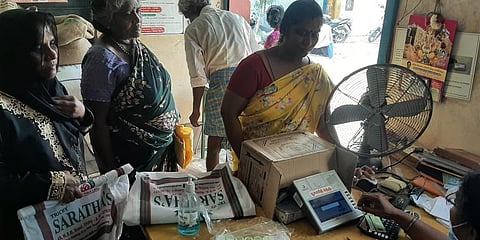 Cardholders waiting to have their biometric credentials verified at a PDS shop. Image used for representation.
