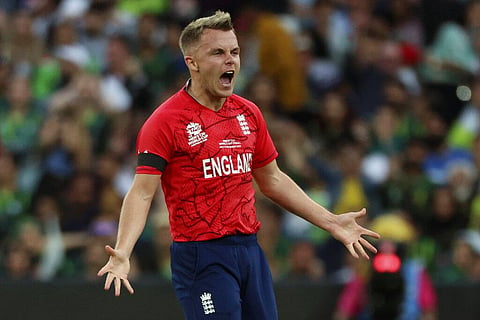 England's Sam Curran celebrates the dismissal of Pakistan's Mohammad Rizwan during the final of the T20 World Cup, Nov. 13, 2022. (Photo | AP)