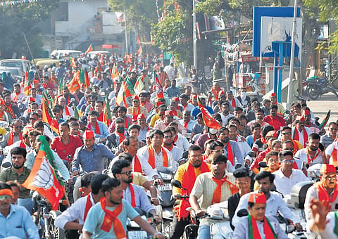 BJP supporters take out an election campaign rally from Ghatlodiya, the constituency of Gujarat Chief Minister Bhupendra Patel in Ahmedabad | pti