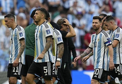 MESSi! The anguish of the losers writ largely on their face, Messi and team leave the field at the end of the World Cup group C soccer match on November 22, 2022. (Photo | AP)