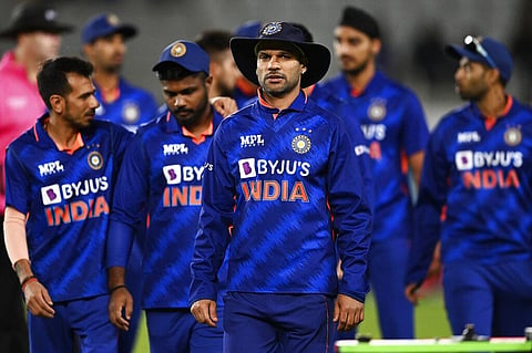 India captain Shikhar Dhawan and teammates leave the field after their loss to New Zealand in the first ODI in Auckland, Nov. 25, 2022. (Photo | AP)