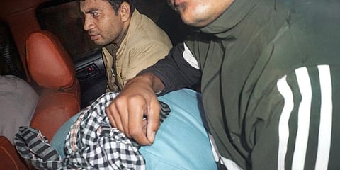 Aaftab Amin Poonawalla, accused in Shraddha Walkar murder case, leaves Forensic Science Laboratory (FSL) as part of ongoing probe. (Photo | PTI)