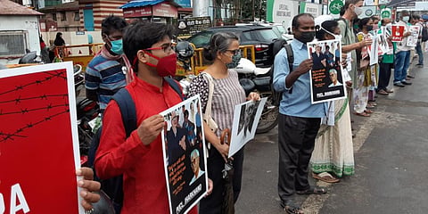In this representational image, activists form a human chain soon after the death of Father Stan Swamy. (File Photo| EPS)