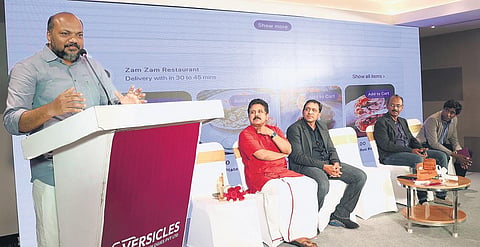 Industries Minister P Rajeeve speaking at the launch of the first outlet of VendnGo in Thiruvananthapuram. Kerala Startup Mission CEO Anoop Ambika, VendnGo co-founder Kiran Karunakaran, Versicles Tech