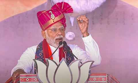 Prime Minister Narendra Modi speaks during a public meeting for Gujarat Assembly elections, at Kalol in Gandhinagar district. (Photo | PTI)