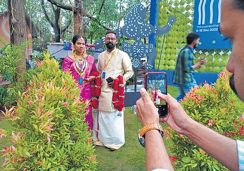 Filmmaker Pampally aka Sandeep Kumar and his wife Surabhi at Tagore Theatre during the 27th IFFK in Thiruvananthapuram on Sunday | B P Deepu