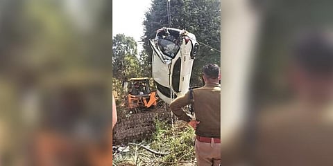  The ill-fated car being pulled out of the abandoned well on Monday | Express 
