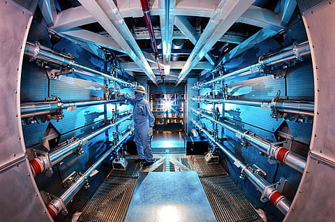For representational purposes. A technician reviews an optic inside the preamplifier support structure at the Lawrence Livermore National Laboratory in Livermore, California | AP