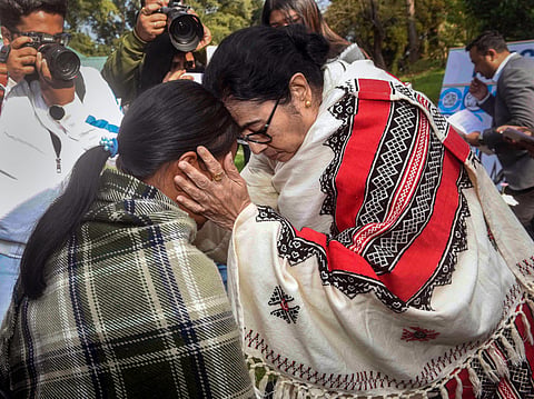 West Bengal Chief Minister Mamata Banerjee meets the families of the Mukroh tragedy victims, during her visit, in Shillong. (Photo | PTI)