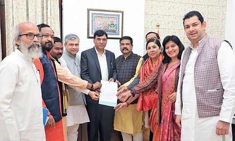 BJP MPs from the state led by Union Minister Dharmendra Pradhan submitting the memorandum to Union Health Minister Mansukh Mandaviya in New Delhi