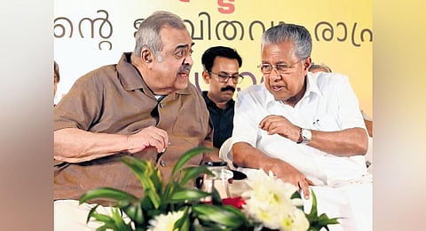 Chief Minister Pinarayi Vijayan having a word with Congress leader K P Unnikrishnan at the launch of the latter’s biography penned by journalist M P Sooryadas in Kozhikode on Saturday | E Gokul