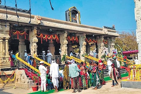 Meshram clam members gather at the Nagoba temple at Keslapur in Indravelli mandal ahead for the idol installation. (Photo | Express)