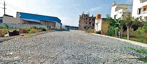 Work underway on a road at Vishweshwaraiah Layout in Kengeri by Bangalore Development Authority. (Photo | Express)