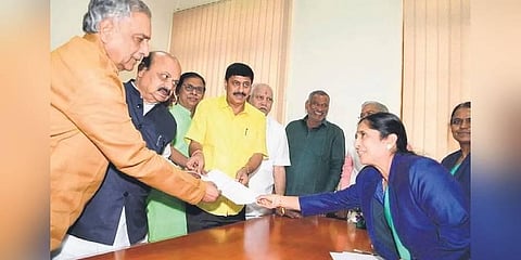 Legislative Council member Basavaraj Horatti files his nomination for the post of Council Chairman, as CM Basavaraj Bommai and former CM BS Yediyurappa look on