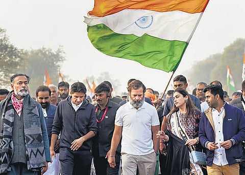 Rahul Gandhi with former MP Deepender Singh Hooda and others during the Bharat Jodo yatra in Nuh on Wednesday. (Photo | PTI)
