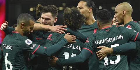 Liverpool players celebrate after Liverpool's Mohamed Salah scored his side's opening goal during EPL match against Aston Villa.(Photo | AP)