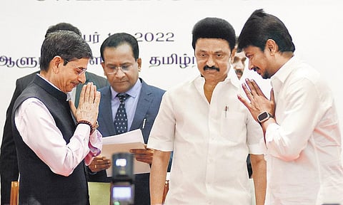 Son becomes minister: Governor R N Ravi greets Udhayanidhi Stalin, as father and chief minister M K Stalin looks on, at the swearing-in ceremony at Raj Bhavan. | Ashwin Prasath
