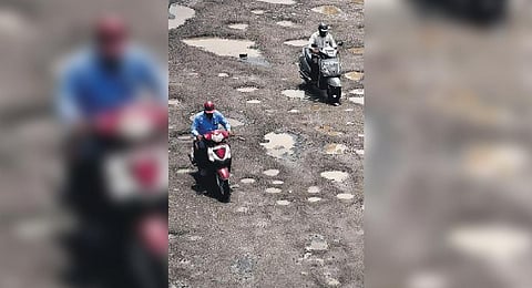 Potholes on road in Bengaluru