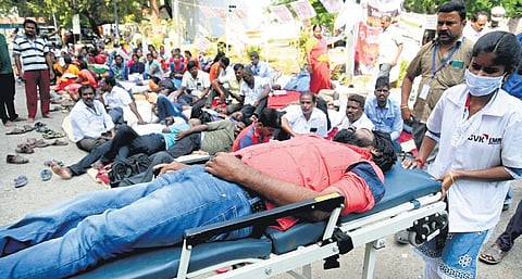 A protester being shifted to hospital after his health deteriorated | R Satish Babu