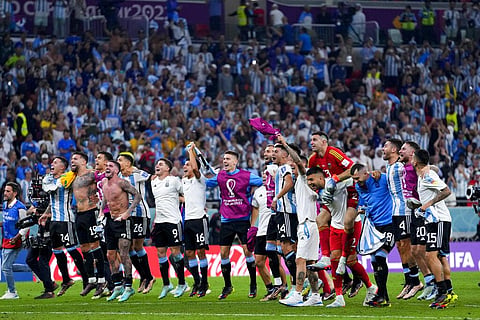 Argentina's players celebrate winning the World Cup round of 16 soccer match between Argentina and Australia at the Ahmad Bin Ali Stadium in Doha, Qatar | AP