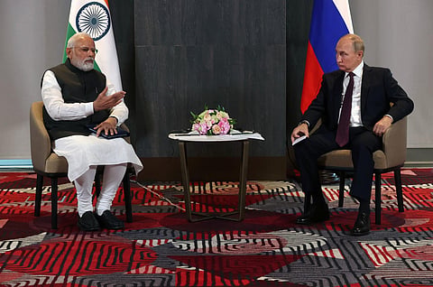 India's Prime Minister Narendra Modi and Russian President Vladimir Putin meet on the sidelines of the SCO summit in Samarkand, Sept. 16, 2022. (Photo | AFP)