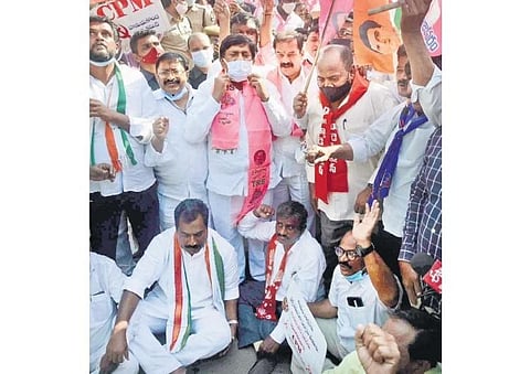 Demanding a railway coach factory at Kazipet as promised in the AP Reorganisation Act, leaders representing different political parties held a demonstration in front of the Rail Nilayam on Monday.