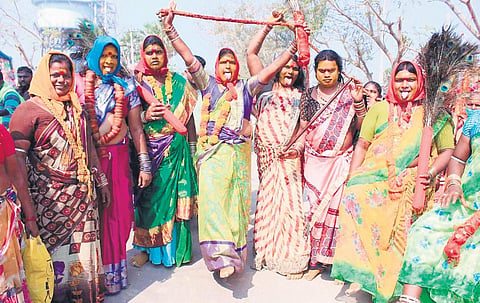 Tribal women perform a ritual dance ahead of Medaram Jatara.