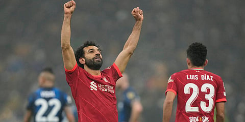 Liverpool's Mohamed Salah celebrates after scoring a goal during a Champions League match against Inter Milan at the San Siro stadium in Milan. (Photo| AP)