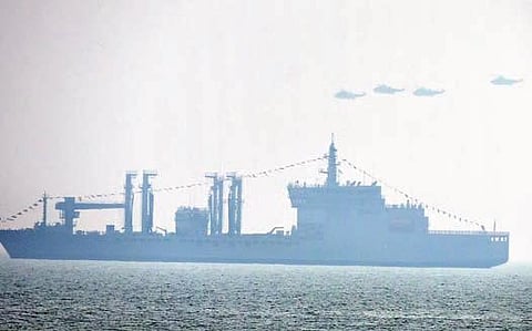 Naval ships rehearsing days ahead of the Presidential Fleet Review, off the RK Beach coast in Visakhapatnam on Friday I G Satyanarayana