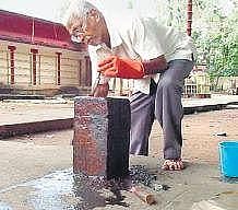 The stone granite pillar on the premises of the temple in Valiyasala