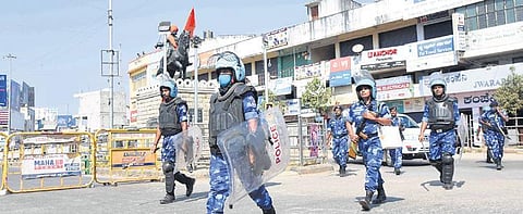 RAF personnel take out a route march in Shivamogga town on Tuesday. (Photo | Vinod Kumar T/EPS)