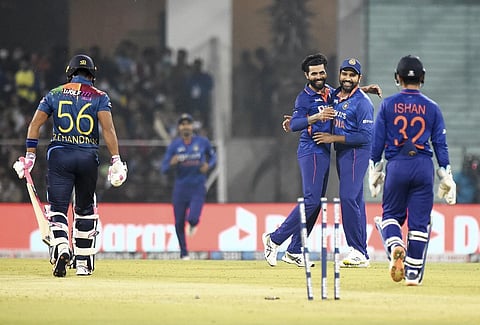 Indian bowler Ravindra Jadeja celebrates with team captain Rohit Sharma, during the 1st T20 cricket match between India and Sri Lanka, at Bharat. (Photo | PTI)