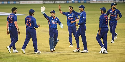 Indian team celebrates the wicket of Sri Lankan batsman Kamil Mishara during their 1st T20I match in Lucknow, Feb 24, 2022. (Photo | PTI)