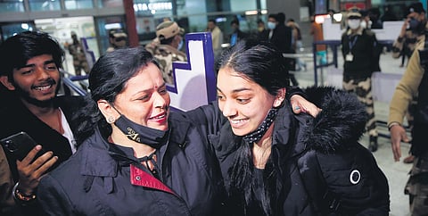 Indian students, who came back from Ukraine amid the crisis in the country, are received by their relatives at Delhi airport. (Photo| Shekhar Yadav, EPS)