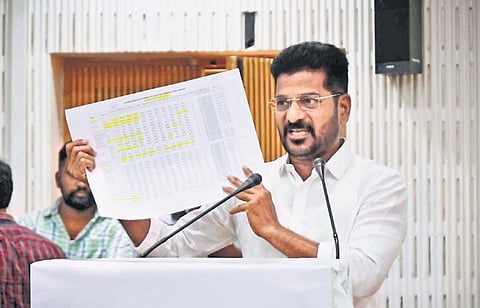 TPCC president and Congress MP Revanth Reddy speaks at Telangana Elecrticity Regularoty Commission Public hearing in Hyderabad on Friday. (Photo | EPS, R V K Rao)