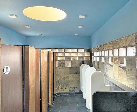 The façade of the toilets enables natural cross ventilation and sunlight to come through; (cutout) the structure was inspired by city’s famous clock towers. (Photo |EPS)