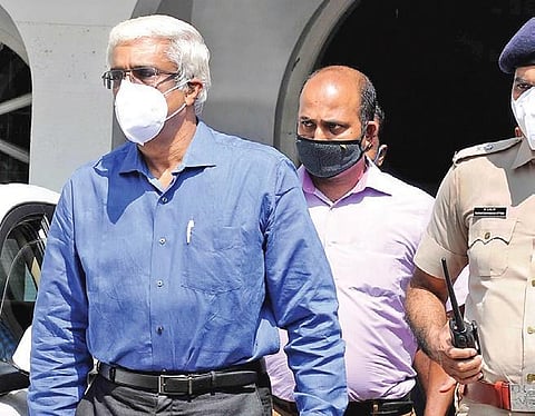 M Sivasankar being taken to the economic offence court in Kochi. (File Photo | A Sanesh, EPS)